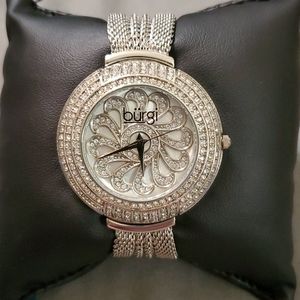 Burgi women's watch. Price tag says $495.